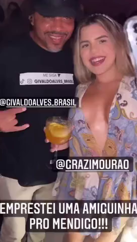 Mendigo comedor pega a Grazi Mourao em festa